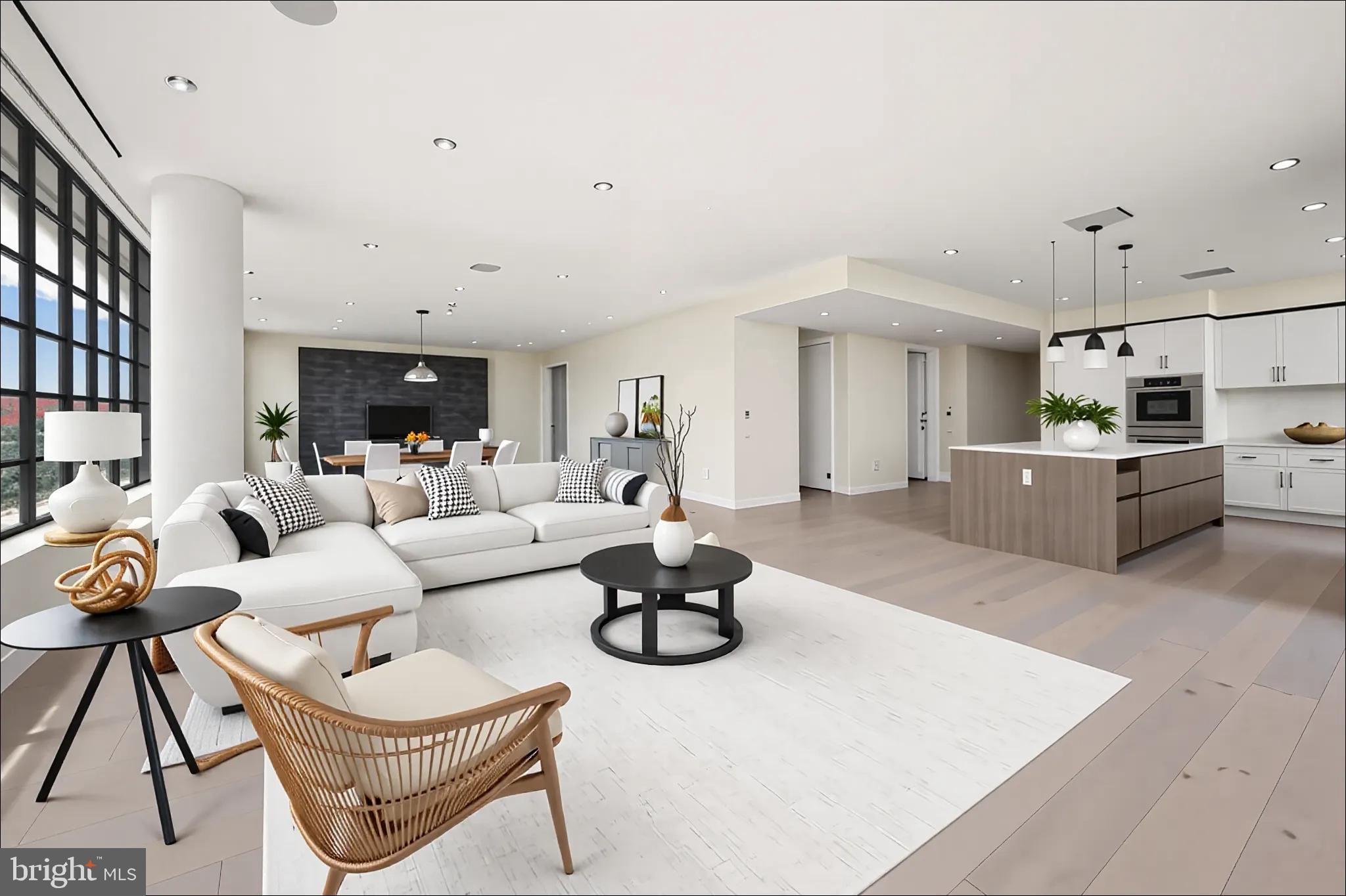 1055 Wisconsin Avenue Northwest, Unit 4E Washington, DC 20007 - Photo 55 of 58 a living room with furniture and a wooden floor