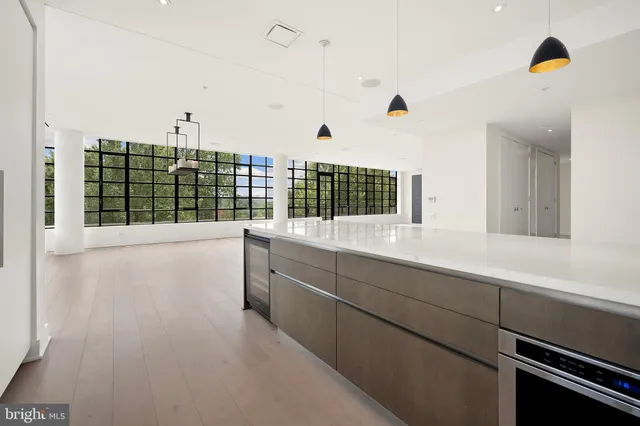 a bathroom with a tub and sink