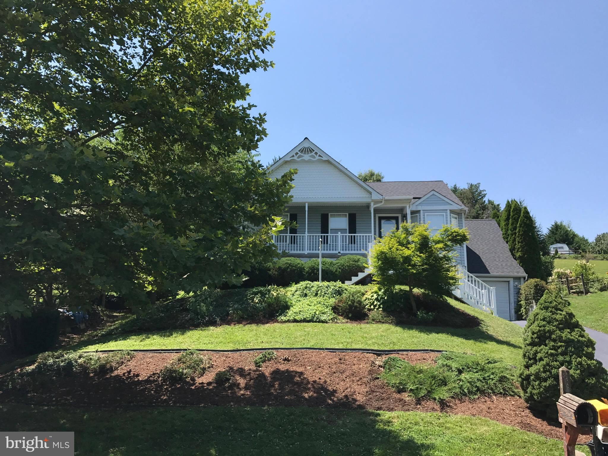 3221 Atlee Ridge Road New Windsor, MD 21776 - Photo 1 of 3 a view of house with yard and green space