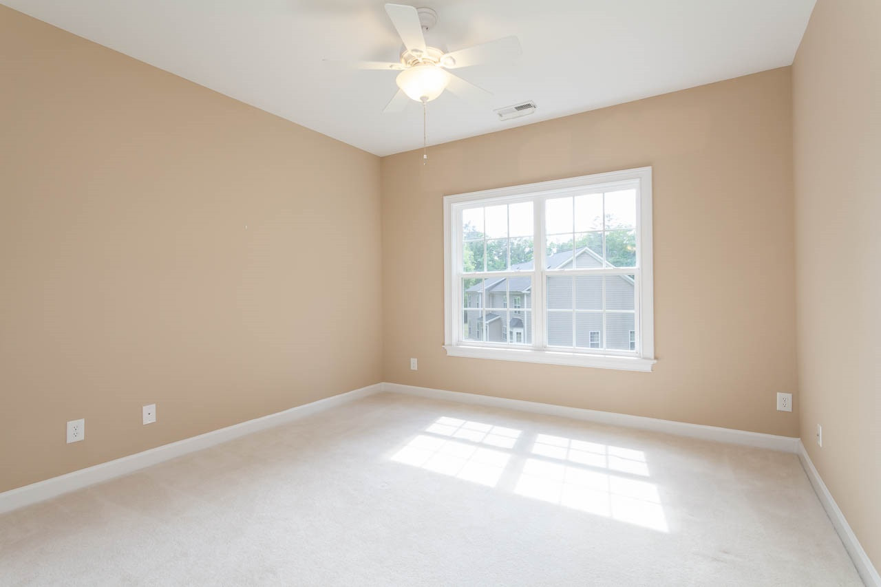 8000 Jessamine Way Raleigh, NC 27612 - Photo 21 of 25 Bedroom #3 enjoys a private bath, walk-in closest and a ceiling fan. Bedroom #3