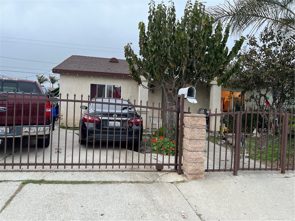 1715 West 154th Street Compton, CA 90220 - Photo 1 of 1 a view of a house with a balcony