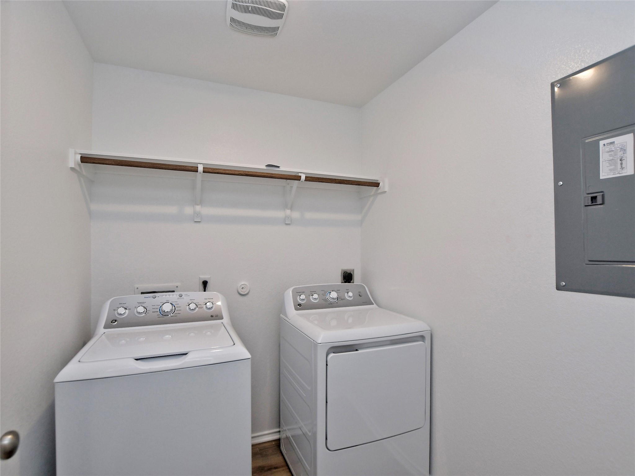 229 Vortex Pass Kyle, TX 78640 - Photo 14 of 32 a utility room with dryer and washer