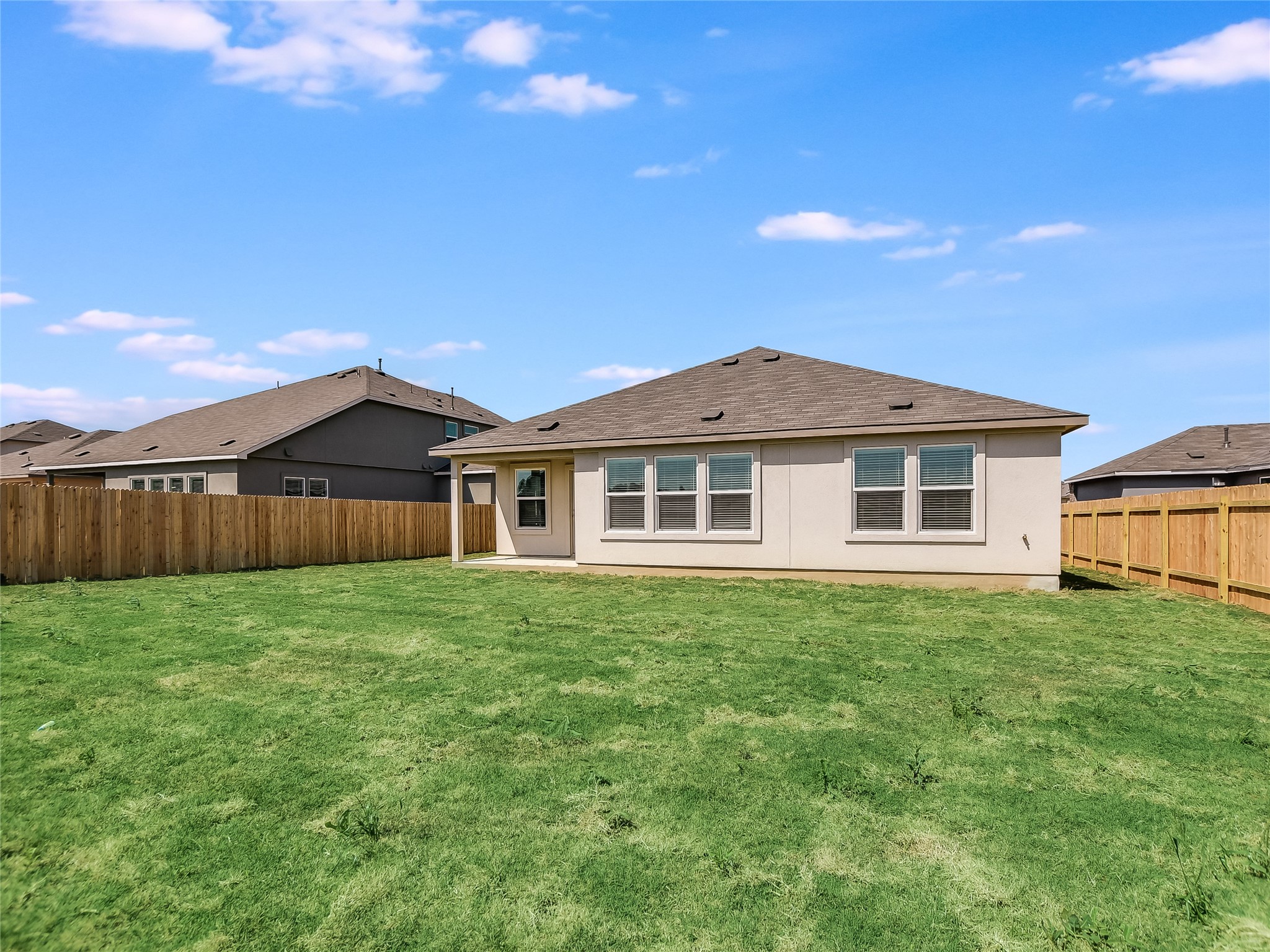 229 Vortex Pass Kyle, TX 78640 - Photo 28 of 32 a house view with a garden space