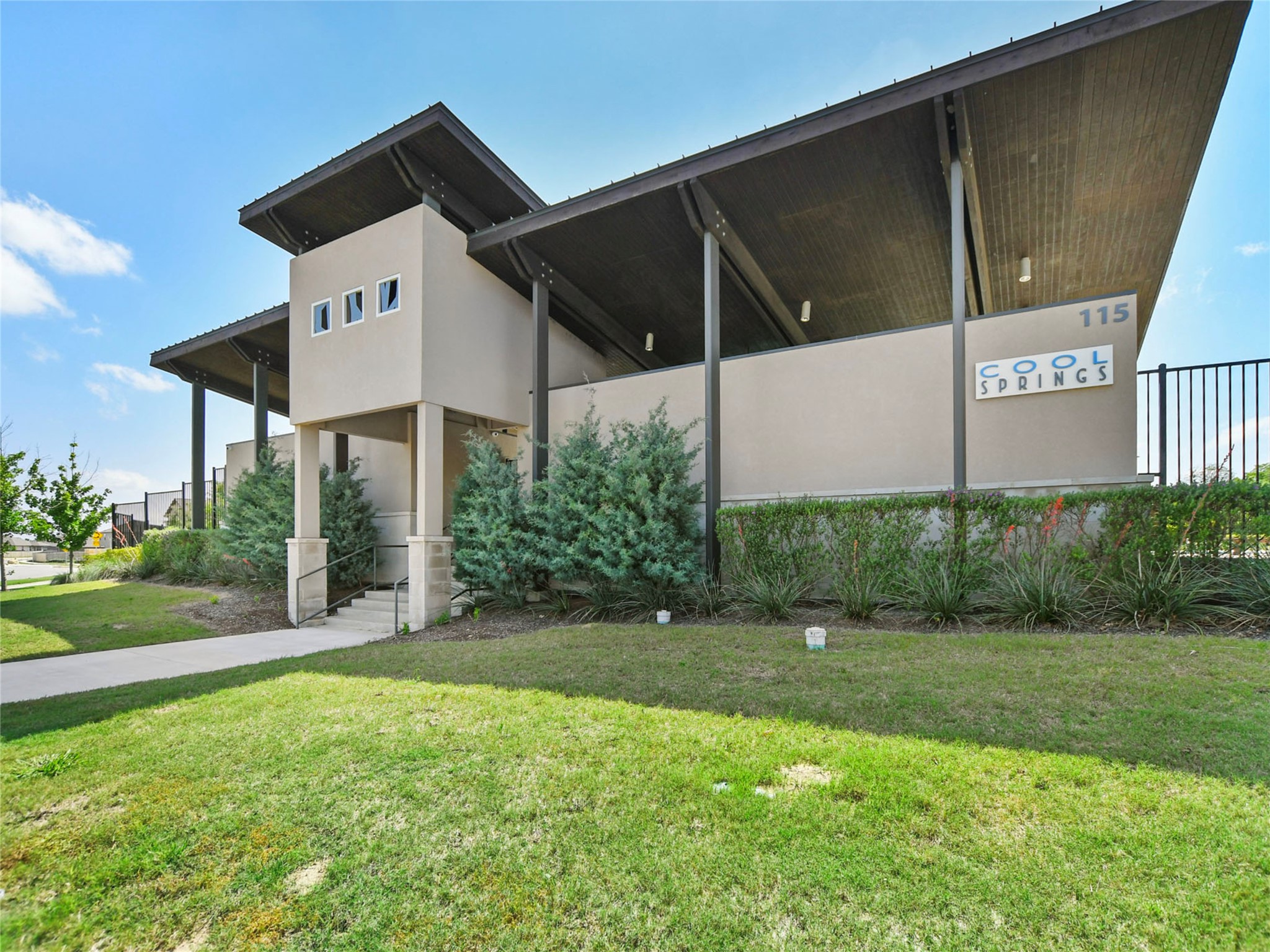 229 Vortex Pass Kyle, TX 78640 - Photo 31 of 32 a view of a house with backyard and garden