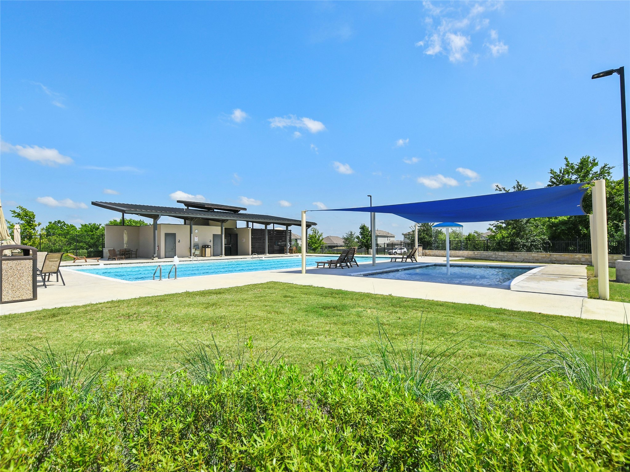 229 Vortex Pass Kyle, TX 78640 - Photo 32 of 32 a view of a house with a swimming pool