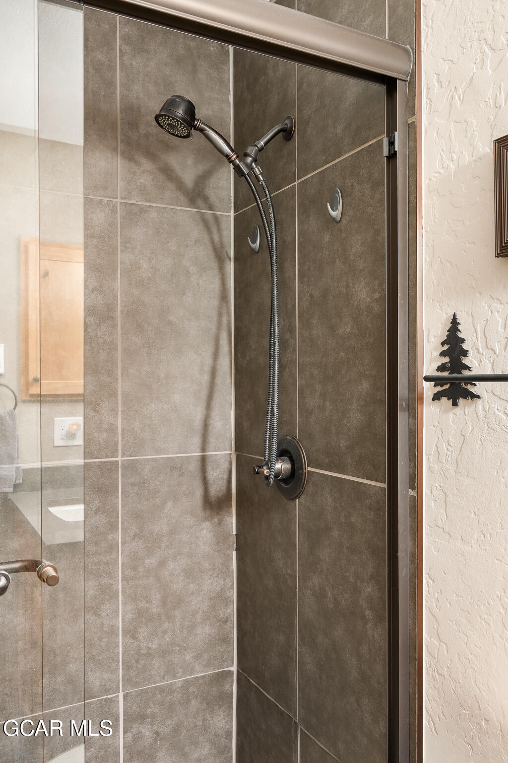 605 Lake Front Road, Unit W8 Grand Lake, CO 80447 - Photo 23 of 28 a bathroom with a shower