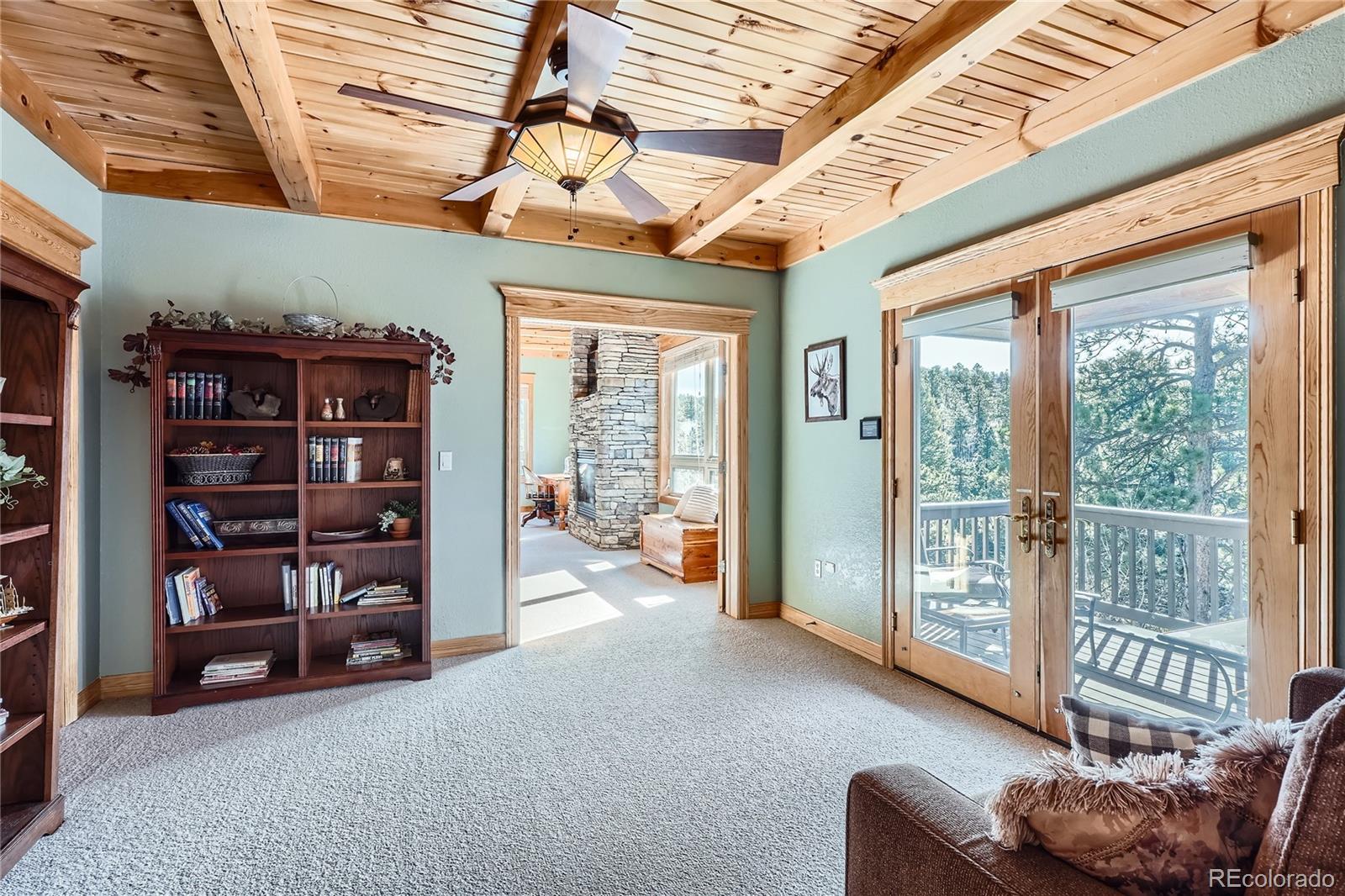 9659 South Turkey Creek Road Morrison, CO 80465 - Photo 14 of 48 a view of livingroom with furniture