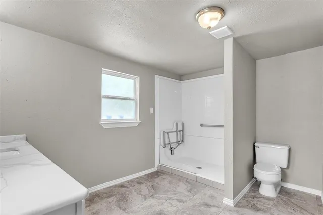 a bathroom with a toilet sink and a bathtub