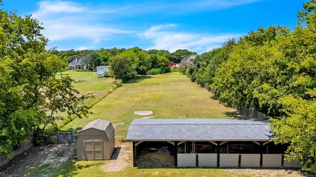 a view of a swimming pool with a patio