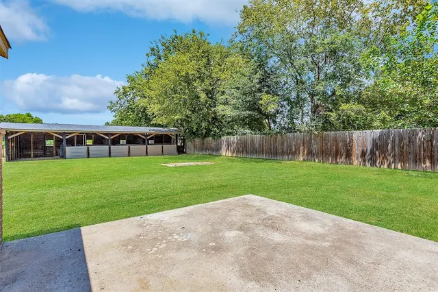 a view of house with garden