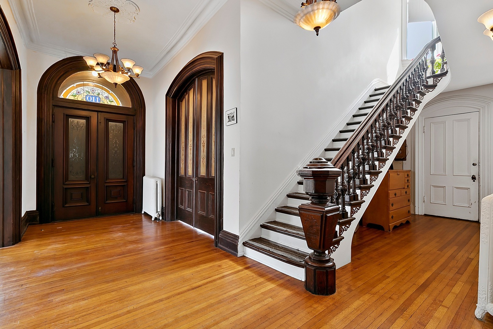 110 Akenside Road Riverside, IL 60546 - Photo 5 of 29 a view of entryway with wooden floor and stairs