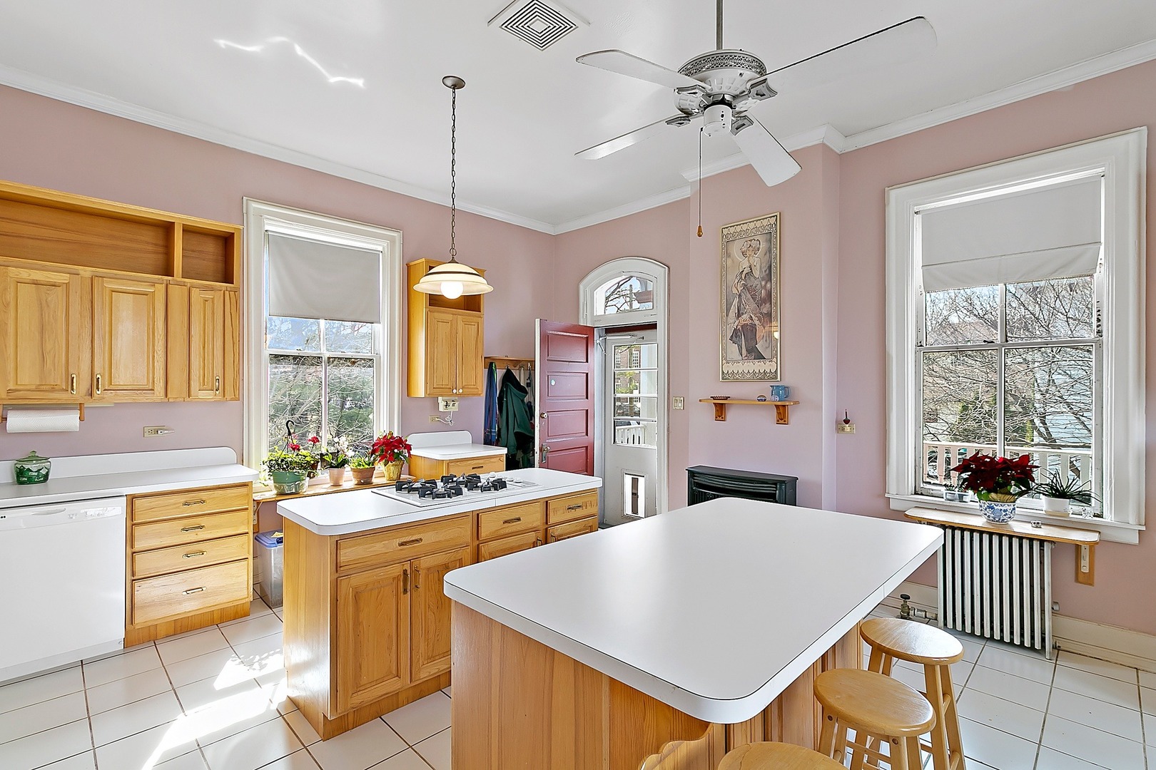110 Akenside Road Riverside, IL 60546 - Photo 8 of 29 a kitchen with a table chairs stove and cabinets
