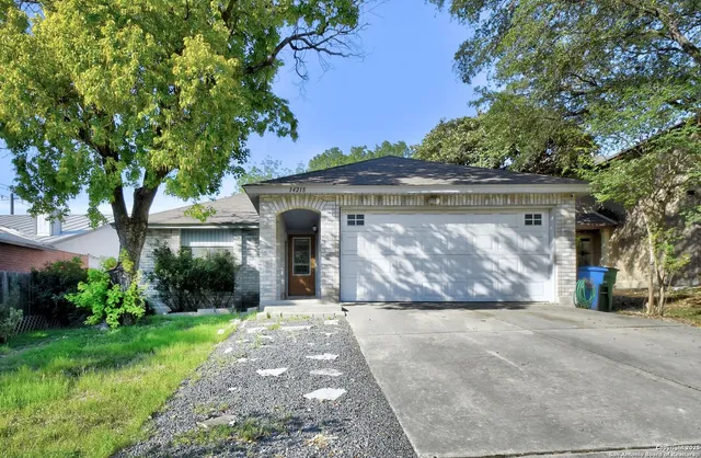 a view of a house with a garden