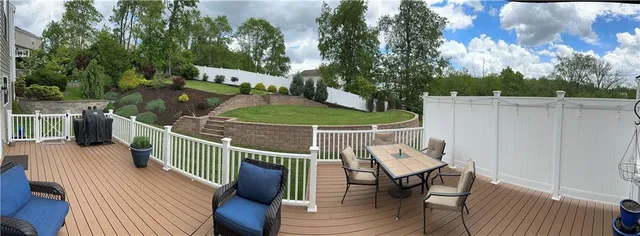a view of a chairs on the roof deck