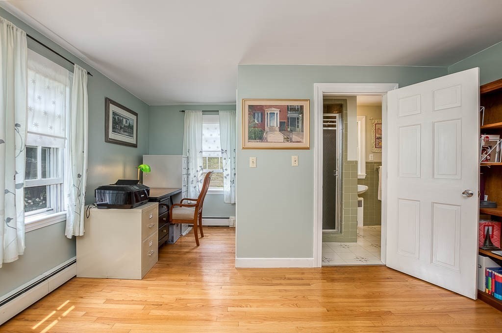 46 Park Street Dedham, MA 02026 - Photo 11 of 35 a living room with furniture and a wooden floor