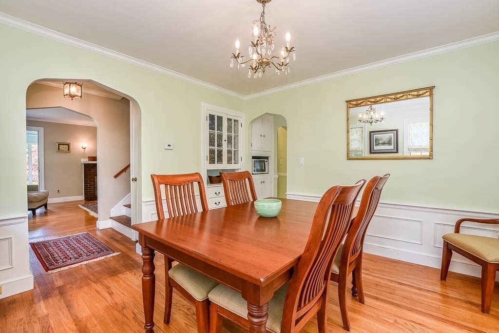 46 Park Street Dedham, MA 02026 - Photo 13 of 35 a view of a dining room with furniture and wooden floor
