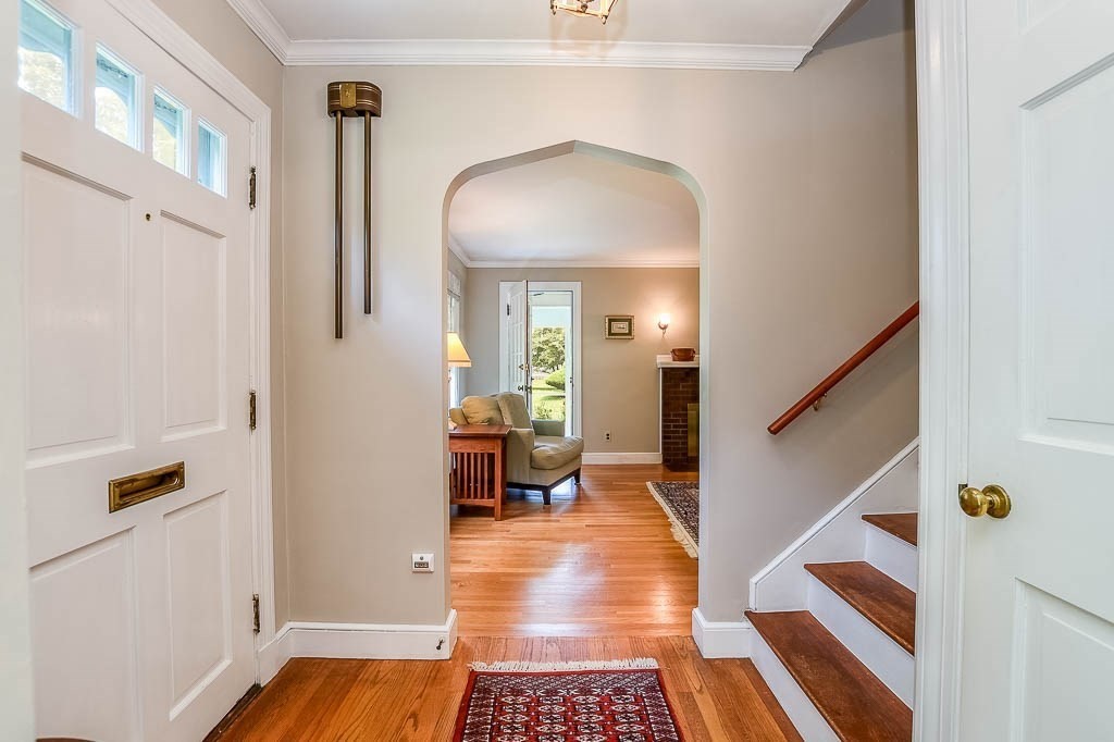46 Park Street Dedham, MA 02026 - Photo 19 of 35 a view of a hallway with furniture and a rug