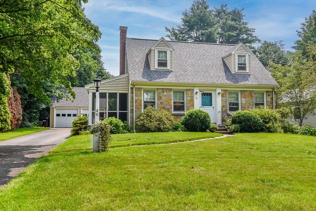 46 Park Street Dedham, MA 02026 - Photo 2 of 35 a front view of a house with a yard