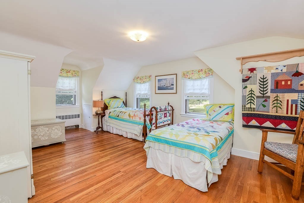 46 Park Street Dedham, MA 02026 - Photo 21 of 35 a living room with furniture and a wooden floor