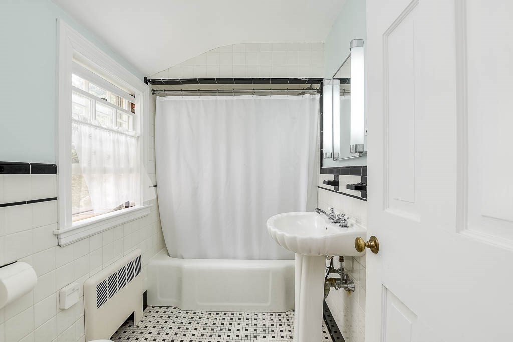 46 Park Street Dedham, MA 02026 - Photo 25 of 35 a bathroom with a sink toilet and shower