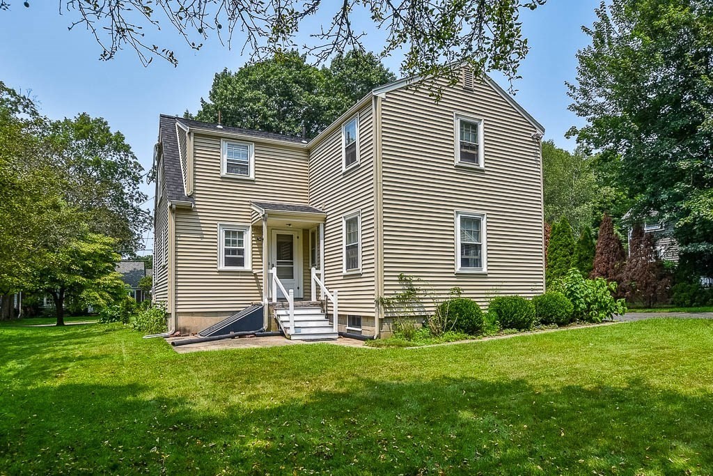 46 Park Street Dedham, MA 02026 - Photo 29 of 35 a view of backyard of house with green space
