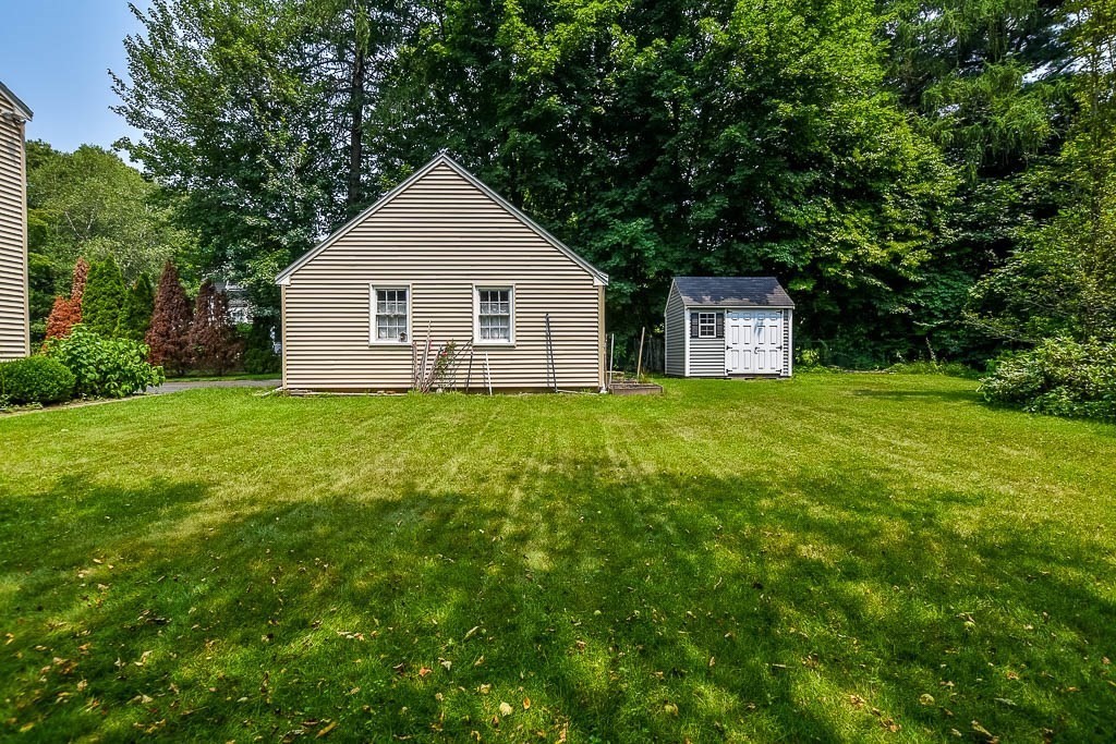 46 Park Street Dedham, MA 02026 - Photo 30 of 35 a view of a house with yard and sitting area