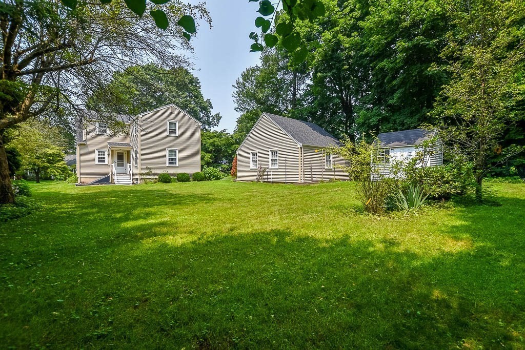 46 Park Street Dedham, MA 02026 - Photo 31 of 35 a view of a house with a yard