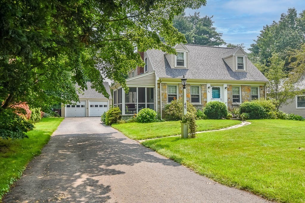 46 Park Street Dedham, MA 02026 - Photo 4 of 35 a front view of a house with garden
