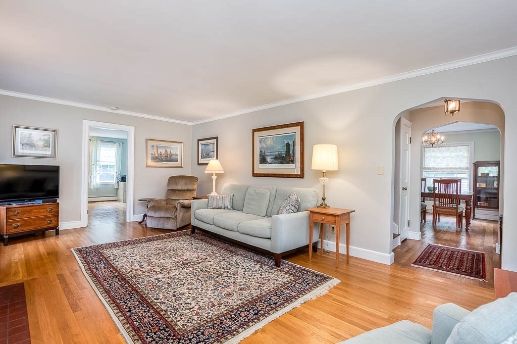 46 Park Street Dedham, MA 02026 - Photo 7 of 35 a living room with furniture and a couch