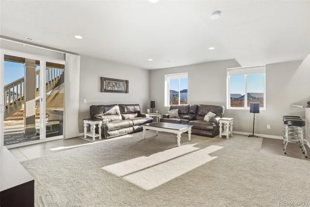 a living room with furniture and a couch