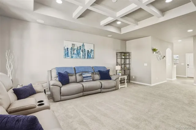 a living room with furniture and a couch