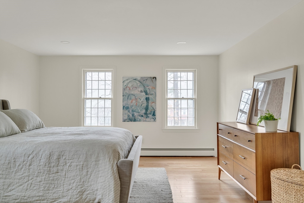8 Highland Road Acton, MA 01720 - Photo 24 of 36 a bedroom with a bed and a window