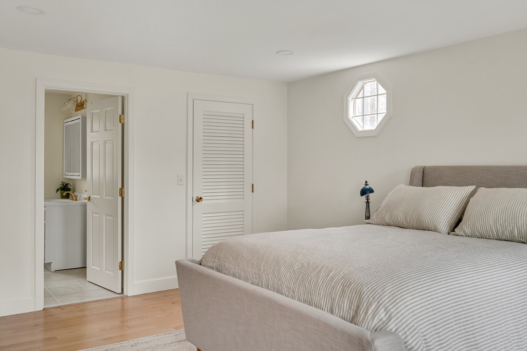 8 Highland Road Acton, MA 01720 - Photo 25 of 36 a bedroom with a bed and a window