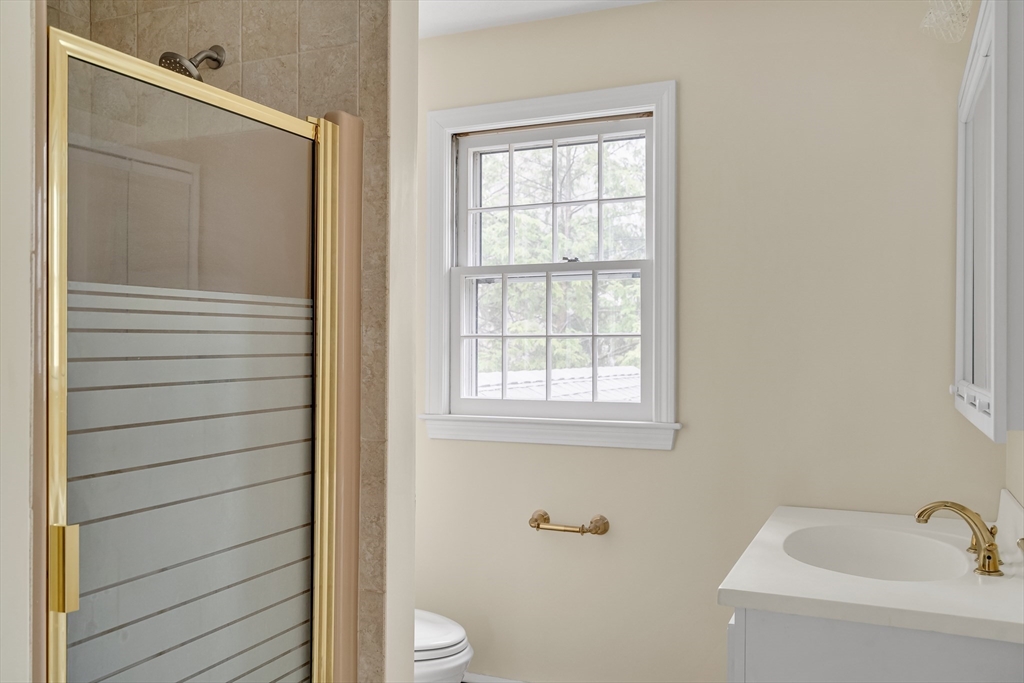 8 Highland Road Acton, MA 01720 - Photo 26 of 36 a bathroom with a toilet and a sink