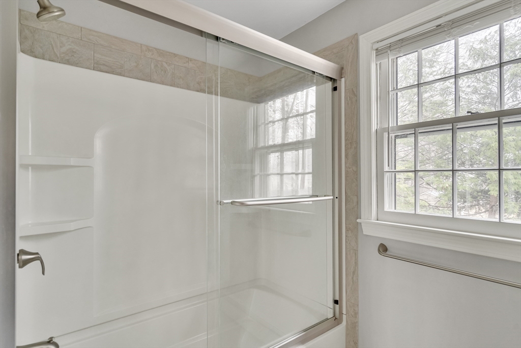 8 Highland Road Acton, MA 01720 - Photo 33 of 36 a bathroom with a bathtub
