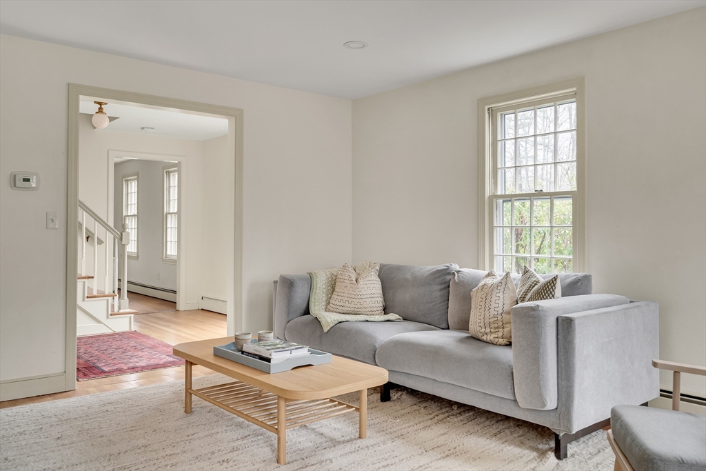 8 Highland Road Acton, MA 01720 - Photo 9 of 36 a living room with furniture and a window