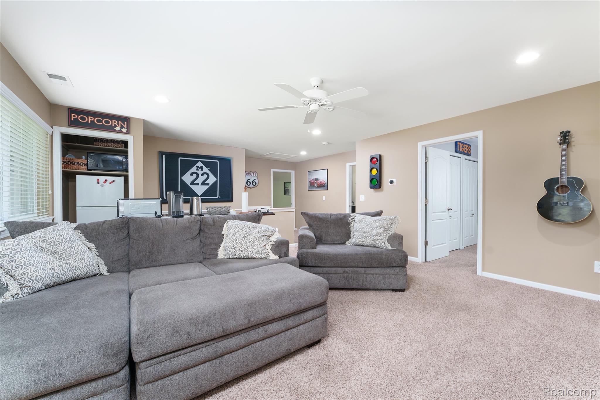 2172 Devonshire Road Bloomfield Hills, MI 48302 - Photo 28 of 45 Recessed lighting illuminates this carpeted room with neutral walls
