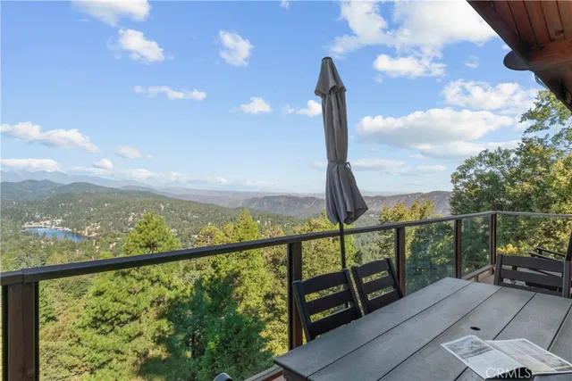 a view of a balcony with city view