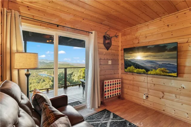 a view of a livingroom with furniture and window
