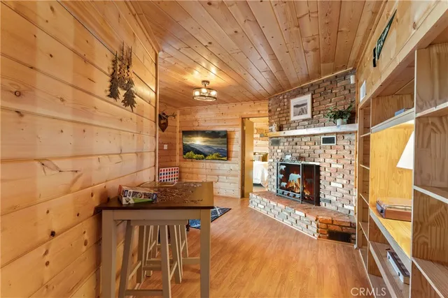 a view of a patio with table and chairs
