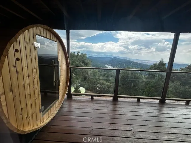 a view of sitting space with wooden floor