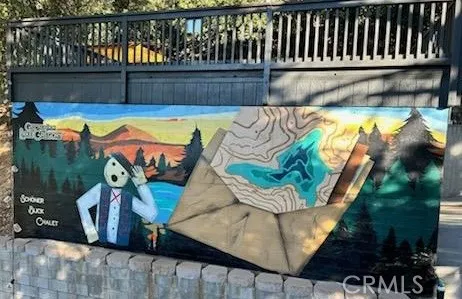 a view of swimming pool with outdoor seating and plants
