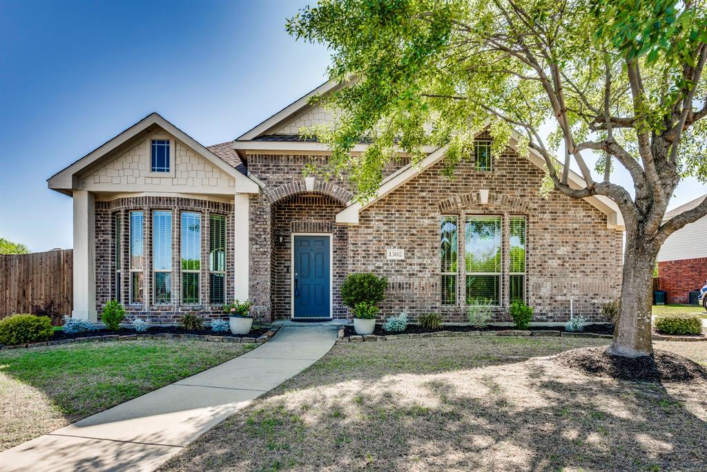 1302 Mc Alpin Road Midlothian, TX 76065 - Photo 1 of 1 front view of a house with a yard