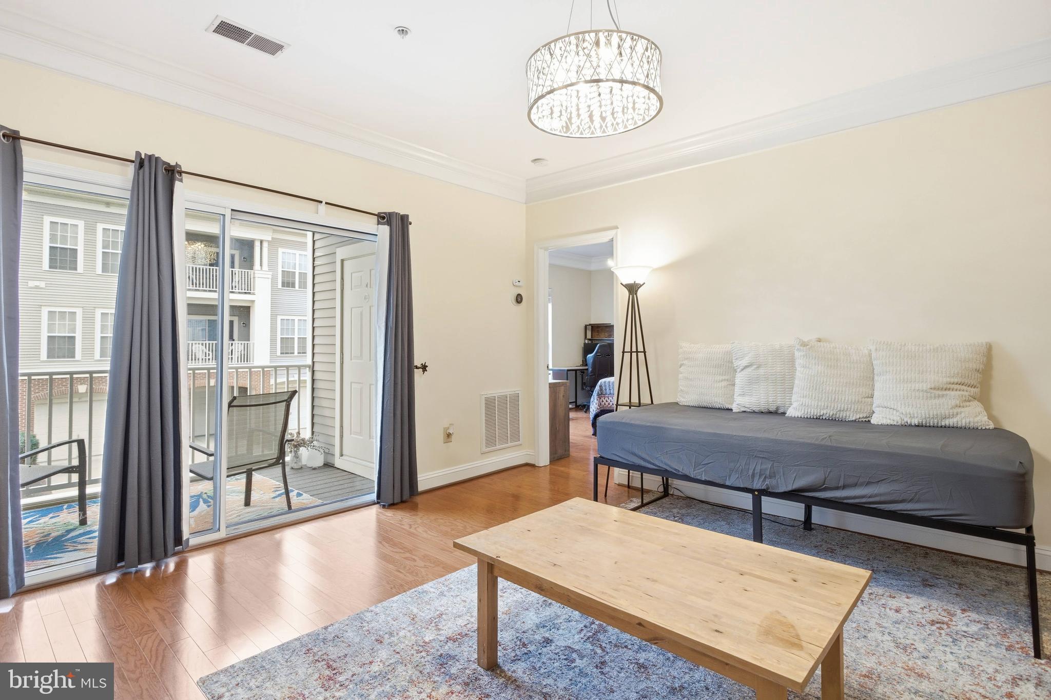 11302 Westbrook Mill Lane, Unit 204 Fairfax, VA 22030 - Photo 19 of 30 a room with a table and chairs