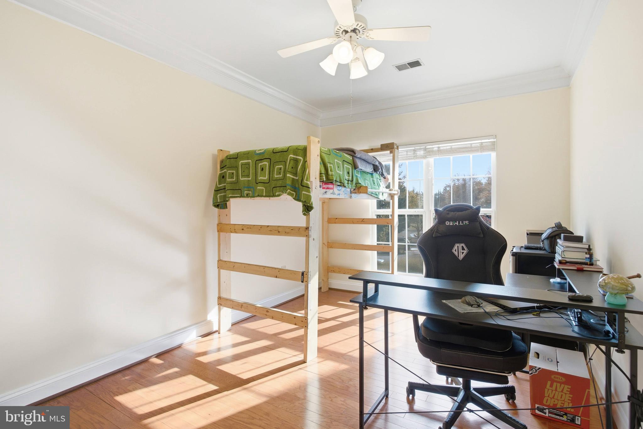 11302 Westbrook Mill Lane, Unit 204 Fairfax, VA 22030 - Photo 28 of 30 a workspace with furniture and a chandelier