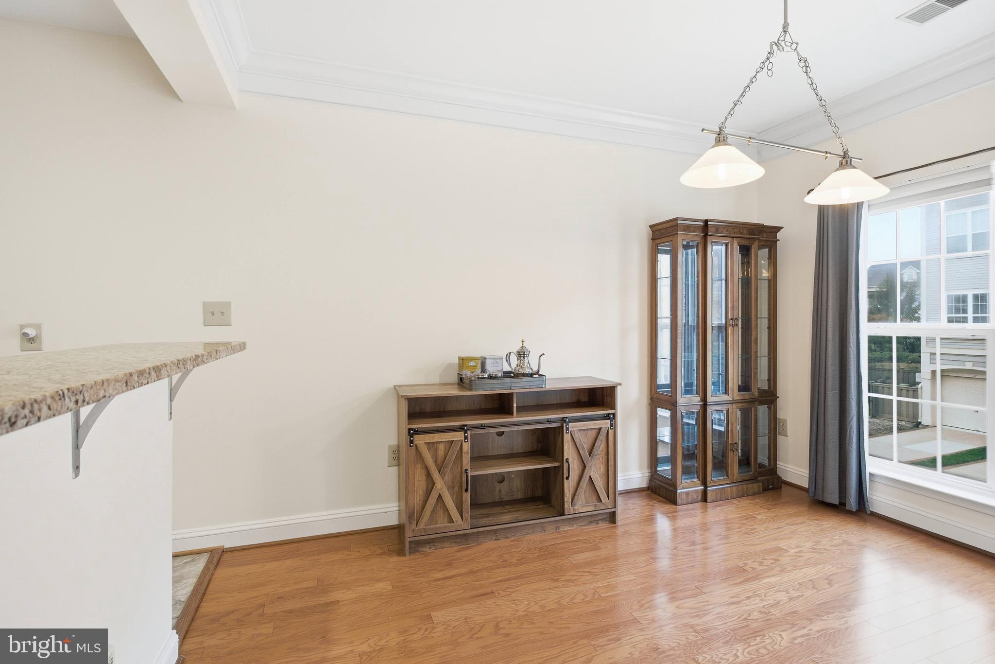 11302 Westbrook Mill Lane, Unit 204 Fairfax, VA 22030 - Photo 7 of 30 a view of a livingroom with a furniture and an entryway