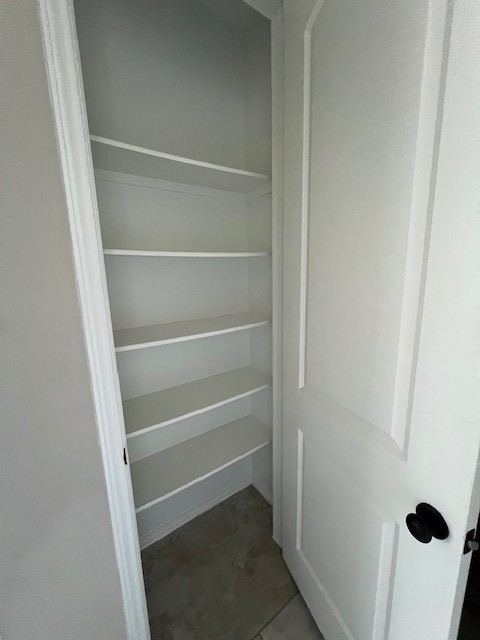 2730 Cutter Court Manvel, TX 77578 - Photo 29 of 39 a view of walk in closet with empty racks
