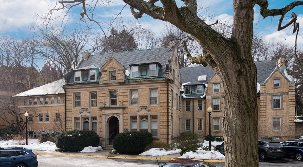 a front view of a building with street view
