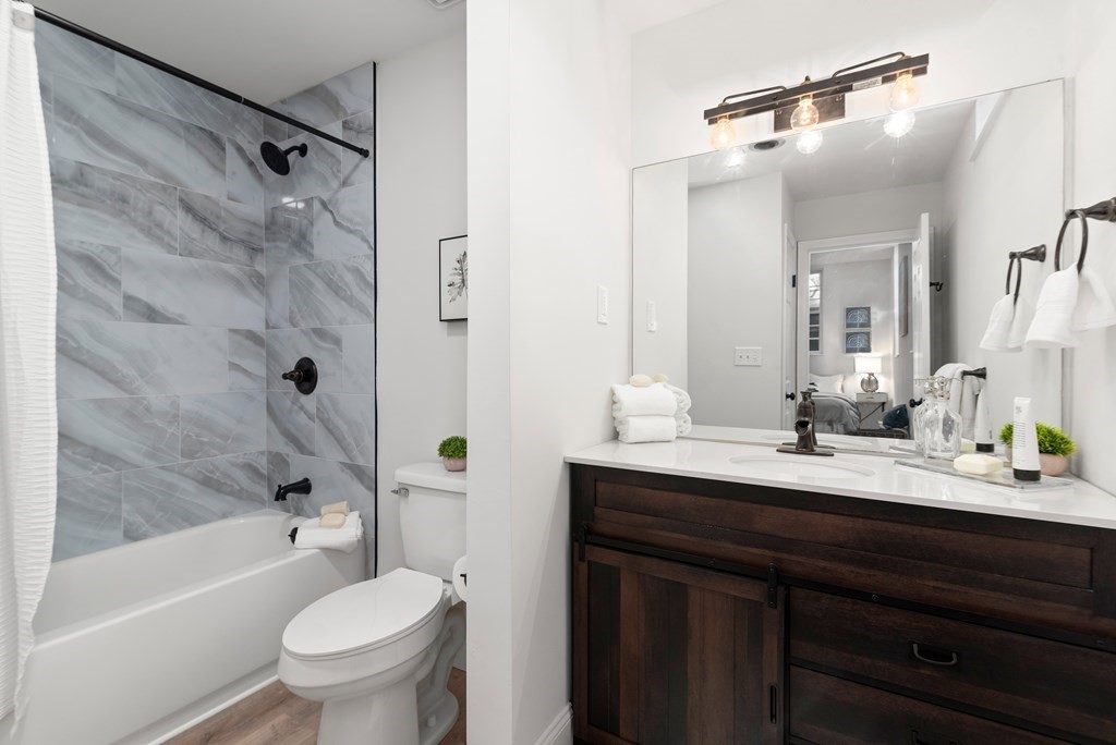 65 Glen Road, Unit H2 Brookline, MA 02445 - Photo 20 of 39 a bathroom with a sink a toilet and shower