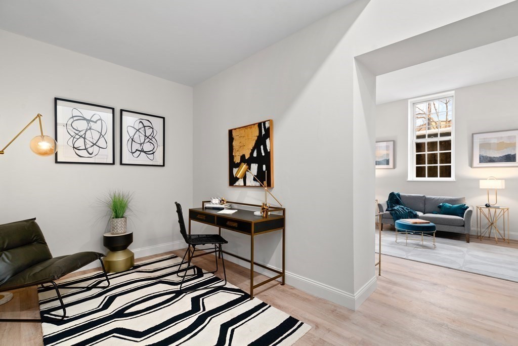65 Glen Road, Unit H2 Brookline, MA 02445 - Photo 25 of 39 a living room with furniture and wooden floor